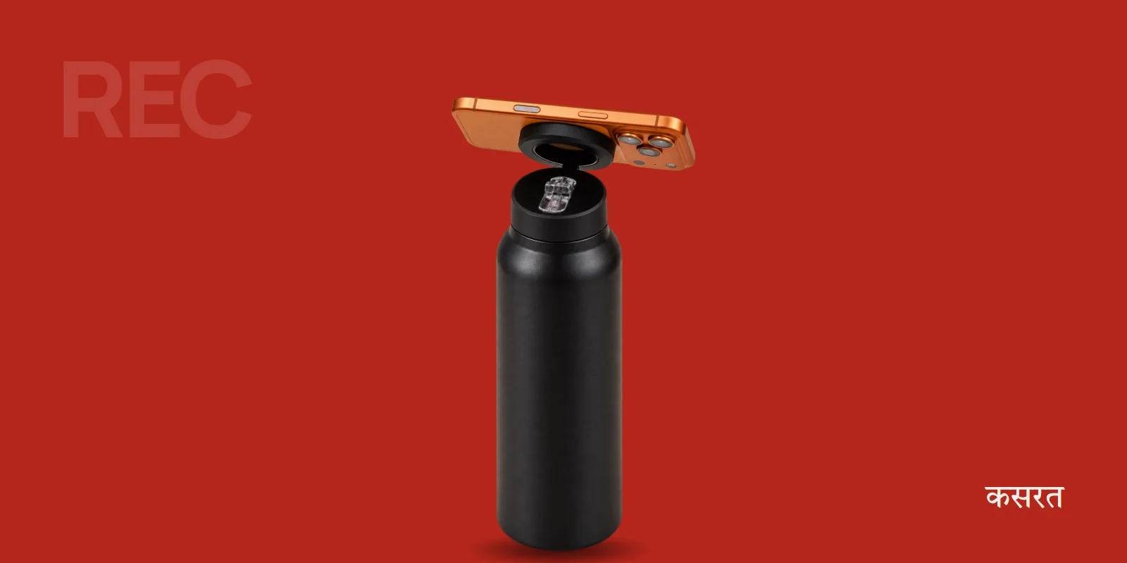 Phone mounted in landscape on the illegalsoup bottle, recording a lifter mid-squat